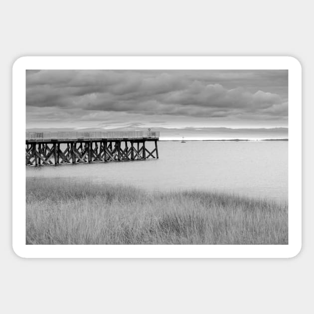 Jetty on Calf Pasture Beach Connecticut under overcast sky in moody monochrome  Wonderful for an art print on  your wall, or even a t-shirt. Sticker by brians101